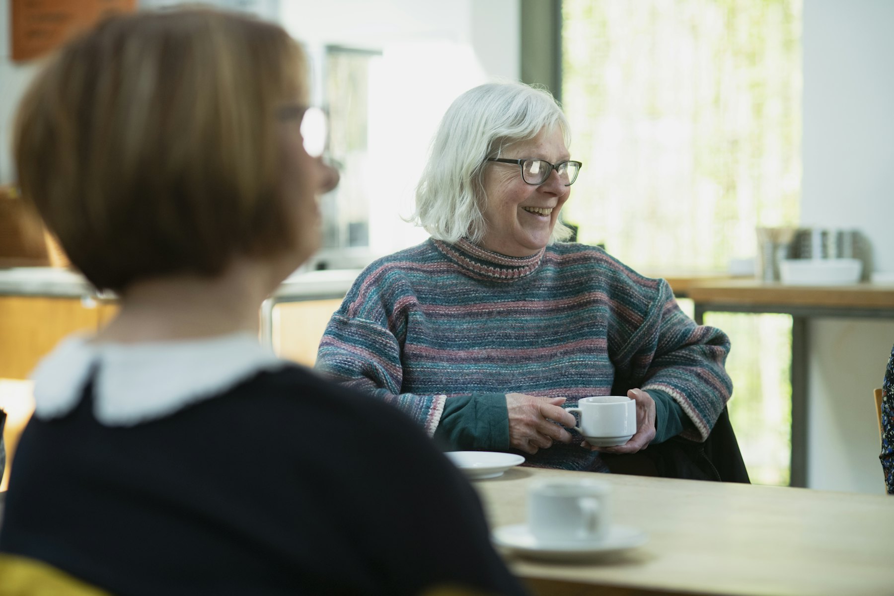 Someone chatting over a cup of tea